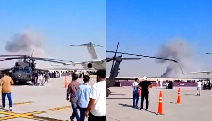 Pakistani journalist laughs